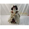 Image 1 : POINSETTIA PORCELAIN DOLL
