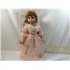 Image 1 : 22" VINYL DOLL IN PEACH DRESS