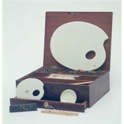 A Victorian mahogany paint box, the compartmented interior and one long drawer partially fitted w...