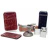 Image 1 : A collection of leather cigar cases and metal lighters including a silvered metal aeroplane light...