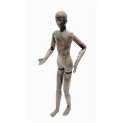 A 19th century Austrian carved pine lay figure stained and fully ball- jointed 1ft.1ins...