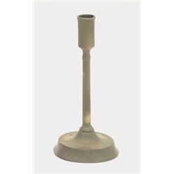 A French brass candlestick, late 16th century, with slender cylindrical stem and a capstan style...