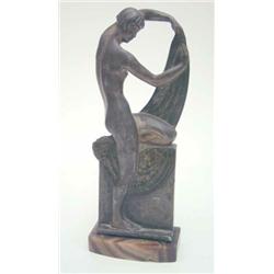 Paul Philippe, French early 20th century, An Art Deco bronze figure,  The Bather , silvered and p...