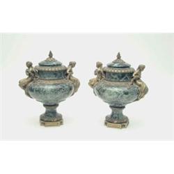 A pair of French late 19th century green marble and gilt bronze urns and covers, each bulbous bod...