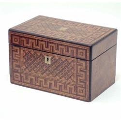 A late 19th century parquetry tea caddy, 8.75ins...