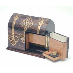 A coromandel casket shaped writing companion, with satin wood interior and gilt metal mounts, 9in...