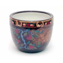 A jardiniere decorated with fruiting sprigs, and a fruiting band, segmented by roundels depicting...