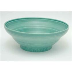 A Susie Cooper green glaze fruit bowl, with lightly fluted body and lappet design foot rim, 12ins...