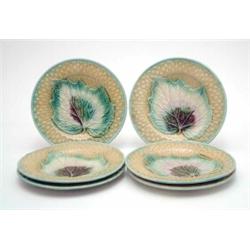A collection of 6 19th century Continental majolica plates, decorated with a vine leaf against a...