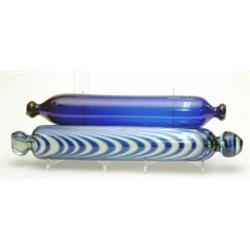 A late Victorian Nailsea-type blue and white glass rolling pin, 14ins, and another, blue glass, 1...
