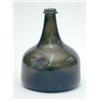 Image 1 : A George I sealed wine bottle, onion shape with high basal kick, seal named Welman and dated 1723...