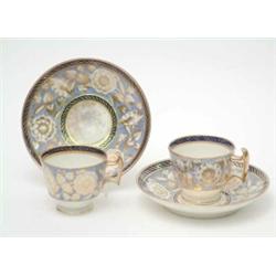 A late Georgian bone china part set of 6 London-shape coffee cups, and 9 saucers gilded with flow...
