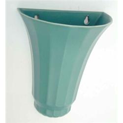 A Wedgwood Keith Murray green semi-circular fluted wall pocket, signature mark, 8.5ins...