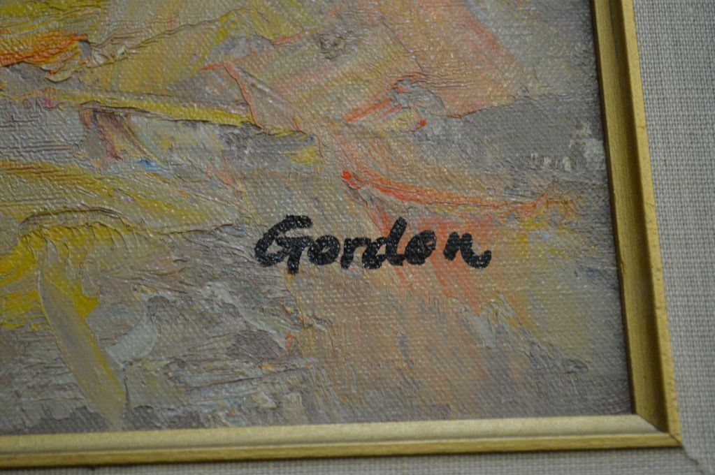 Framed oil on canvas painting of a European street scene signed by artist Gordon 20" X 15"