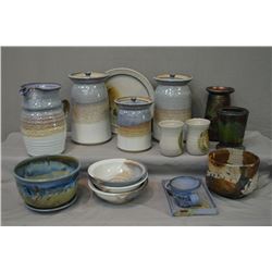Large selection of artisan hand made pottery including pitcher, canister set, bowls, raku vase etc.