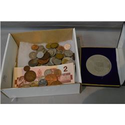 Selection of collectible coins and paper money including two Canadian $1 bills and one $2, 1967 Flyi