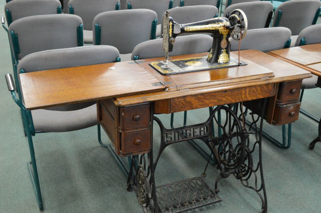 Vintage Singer treadle sewing machine with five drawer sewing