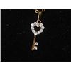 Image 1 : NECKLACE - 10K GOLD PENDANT AND CHAIN - KEY PENDANT WITH HEAT SHAPED TOP - WHITE CUBIC ZIRCONIAN STO