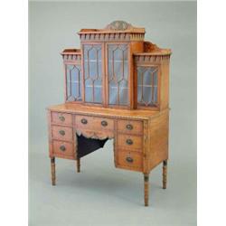 An Edwardian Sheraton Revival painted satinwood writing cabinet decorated with cherub panel, corn...