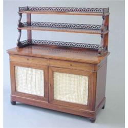 A 19th century French rosewood chiffonier with two tier shelf back with fleur de lis fretwork gal...