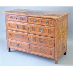 An 18th century South Italian walnut and crossbanded commode the top with two circular starburst...