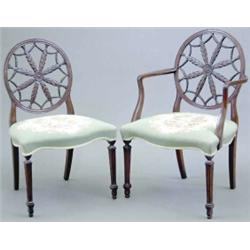 A set of eight 19th century George III design mahogany wheelback dining chairs, including 2 carve...