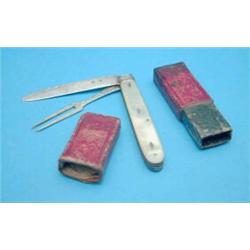 A George III combined silver fruit knife and fork, in red leather case....