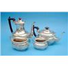 Image 1 : A George V 4- piece silver tea and coffee set, of demi-fluted rectangular form, 1911, Gross 53oz....