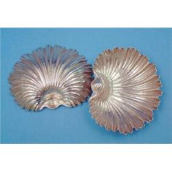 A pair of Sterling bonbon dishes, of scallop form....