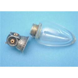 A Victorian novelty scent flask, with silver owl head lid, 1895, 2 ins....