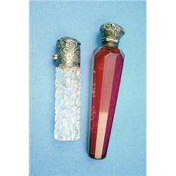 A Victorian silver mounted ruby glass scent flask, and a cut glass scent flask....
