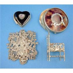 A Chinese white metal miniature chair, a buckle and two pill boxes....