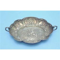 A 19th century Dutch silver trinket dish, decorated with boar hunters, import marked, 7.5 ins....