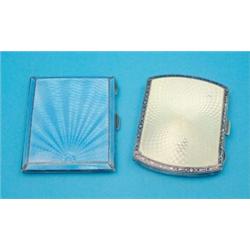 A George V silver cigarette case, with yellow and black enamelled decoration, and a similar blue...