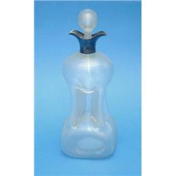 An Edwardian silver mounted ribbed glass decanter....