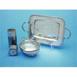 A silver butter dish stand, a shaving brush case and a bonbon basket....