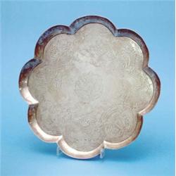 A George I style white metal salver of lobed octagonal form, 13 ins....