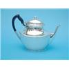 Image 1 : A Victorian silver teapot of oval form with ebonised handle, Birmingham 1898, (gross 25 oz.)...