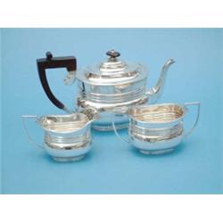 A George V 3 piece silver tea set of rounded rectangular form, Sheffield 1918, (Gross 24 oz.)...