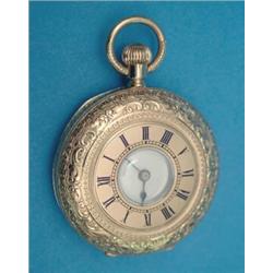 An 18k gold keyless half hunter fob watch with floral engraved case and three quarter plate movem...
