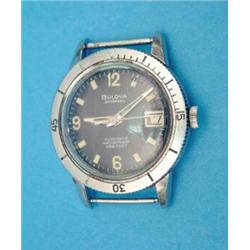 A gentlemans steel Bulova Automatic wrist watch with black dial and date aperture....