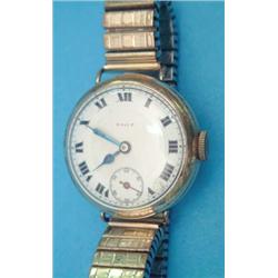 A gentlemans rolled gold wrist watch with enamelled Roman dial and subsidiary seconds, dial and m...