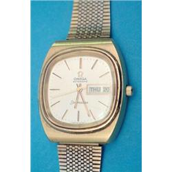 An gentlemans gold plated Omega Seamaster wrist watch with oblong case and day/date aperture....