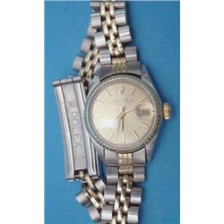 A ladys steel and gold Rolex Oyster Perpetual Date wrist watch with centre seconds....