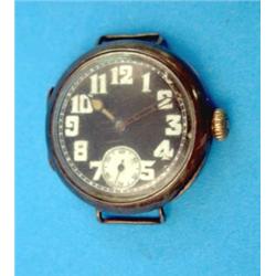 An early 20th century silver Rolex wrist watch with black arabic dial and subsidiary seconds, 191...