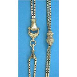 A French gold guard chain, with chased slide and 'gloved hand' clip, 26.3grms...