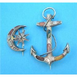 A Scottish silver agate set anchor brooch, together with a similar star and crescent brooch...