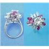 Image 1 : An 18ct white gold diamond and ruby dress ring, set with a brilliant cut diamond (approximately 1...