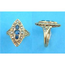 An 18ct gold sapphire and diamond marquise shaped cluster ring...