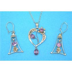 A 9ct gold heart shaped openwork pendant, set amethysts and seed pearls on fine gold chain, toget...